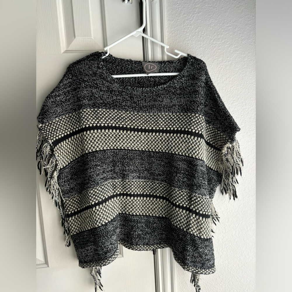 Black and white sweater poncho